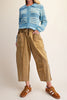 washed ochre pull on pants with unique pocket detailing and exposed seams throughout