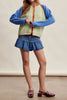 knit raglan-style cardigan with a color blocked design and special blanket stitched details