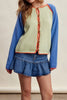 knit raglan-style cardigan with a color blocked design and special blanket stitched details