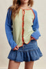 knit raglan-style cardigan with a color blocked design and special blanket stitched details