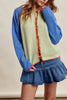 knit raglan-style cardigan with a color blocked design and special blanket stitched details