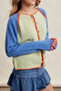 knit raglan-style cardigan with a color blocked design and special blanket stitched details