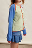 knit raglan-style cardigan with a color blocked design and special blanket stitched details