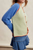 knit raglan-style cardigan with a color blocked design and special blanket stitched details