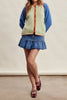 knit raglan-style cardigan with a color blocked design and special blanket stitched details