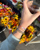 Hair Tie Bracelets Pack with a colorful striped design
