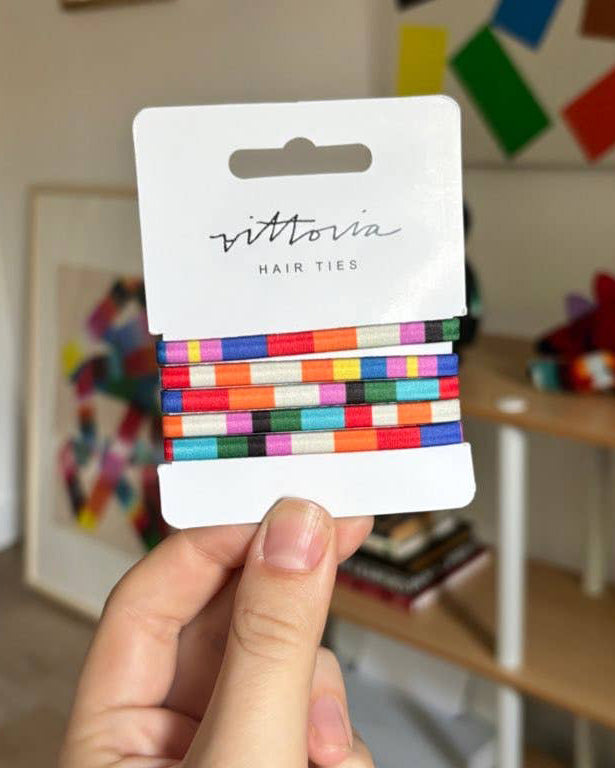 Hair Tie Bracelets Pack with a colorful striped design