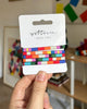 Hair Tie Bracelets Pack with a colorful striped design