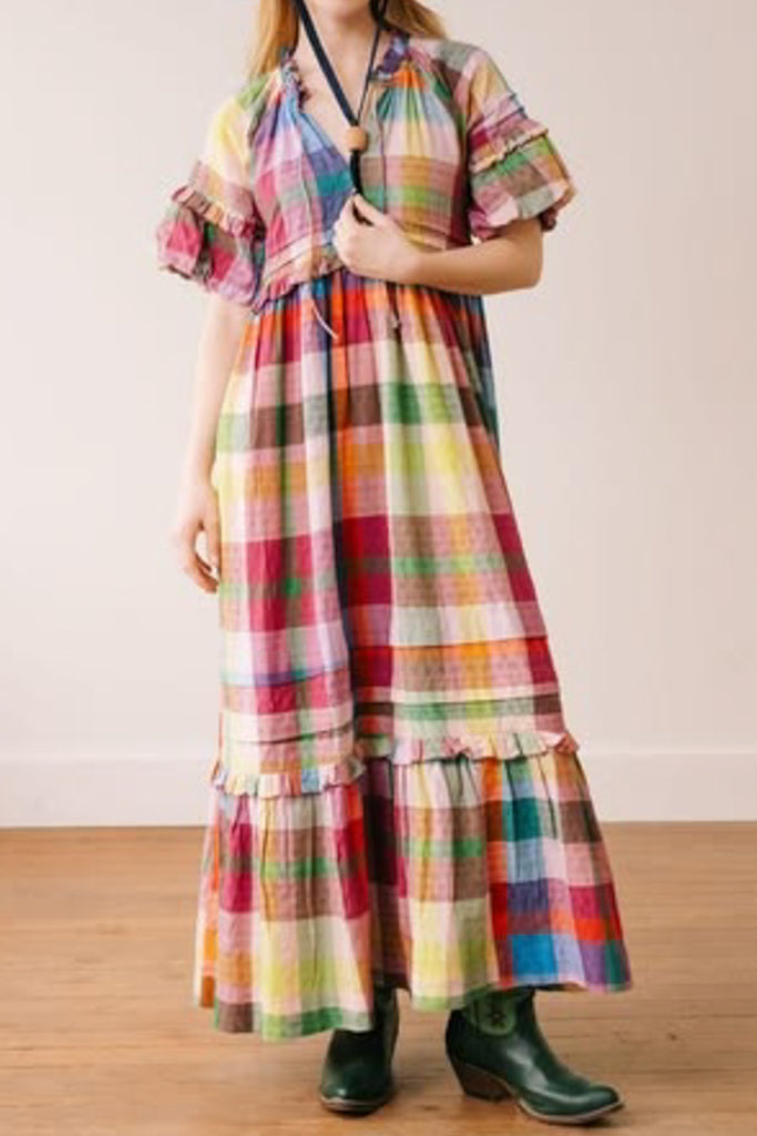 flowy maxi dress in a colorful plaid pattern