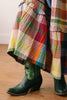 flowy maxi dress in a colorful plaid pattern