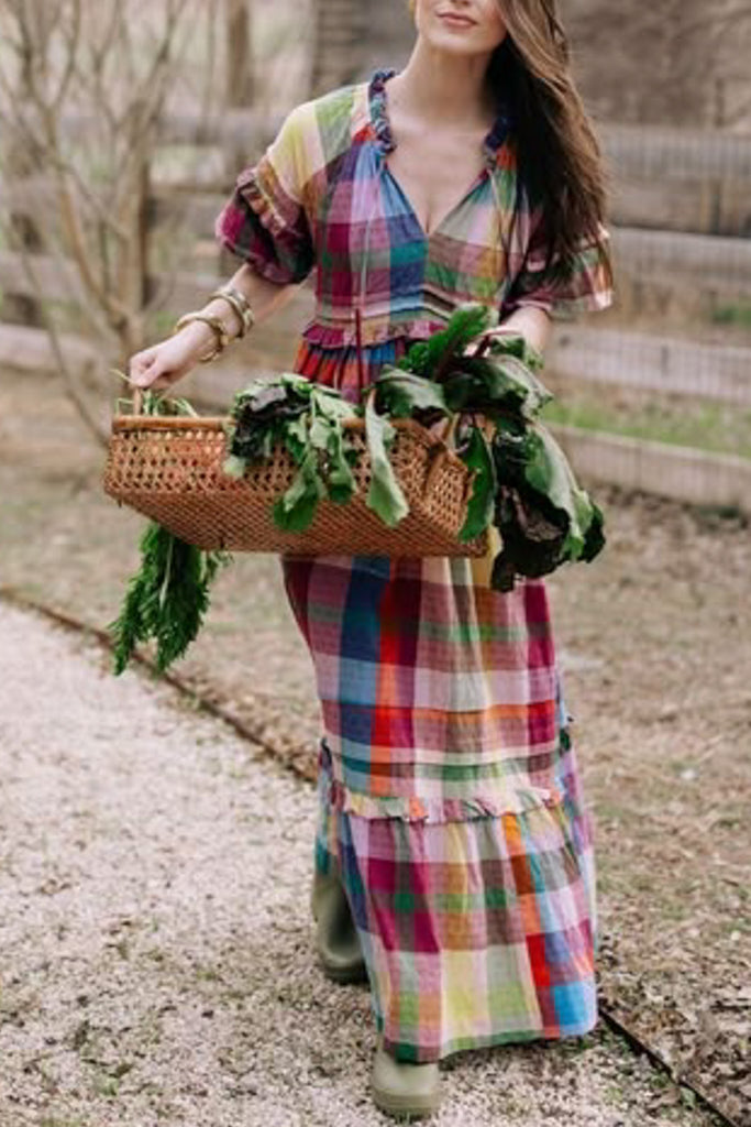 flowy maxi dress in a colorful plaid pattern