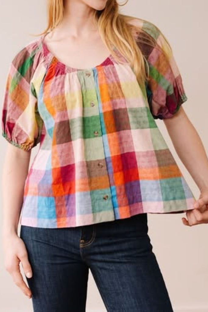 button down top with a scoop neckline, puff sleeves, and a colorful plaid pattern