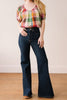 button down top with a scoop neckline, puff sleeves, and a colorful plaid pattern