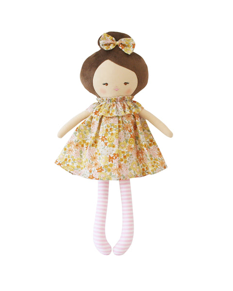 harper doll in a dress in a sweet marigold floral pattern