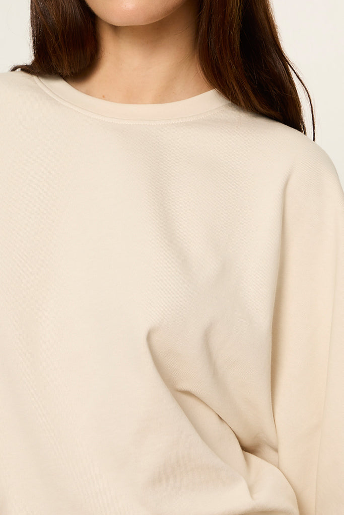 bone white tee with elevated cape sleeves