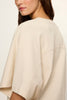 bone white tee with elevated cape sleeves
