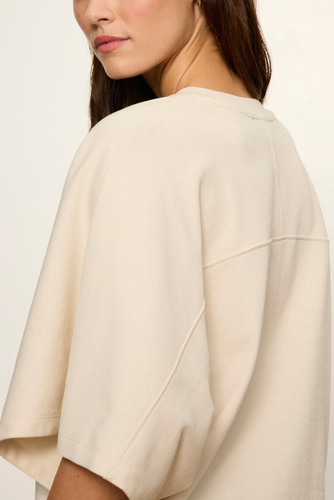 bone white tee with elevated cape sleeves