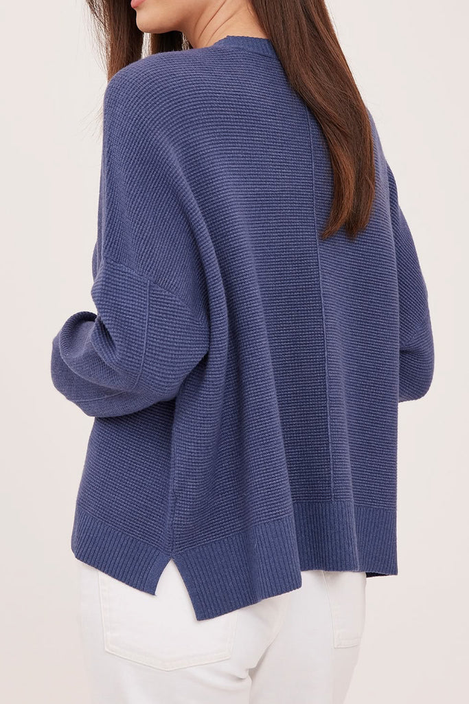 luxe feeling soft navy blue sweater with a waffled texture