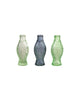 small colored glass vase in the shape of a fish