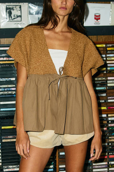 oversized mixed media peplum top with front tie detail 