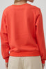 orange crew neck sweatshirt with an embroidered horse design and the message "lucky you."