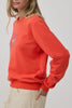 orange crew neck sweatshirt with an embroidered horse design and the message "lucky you."