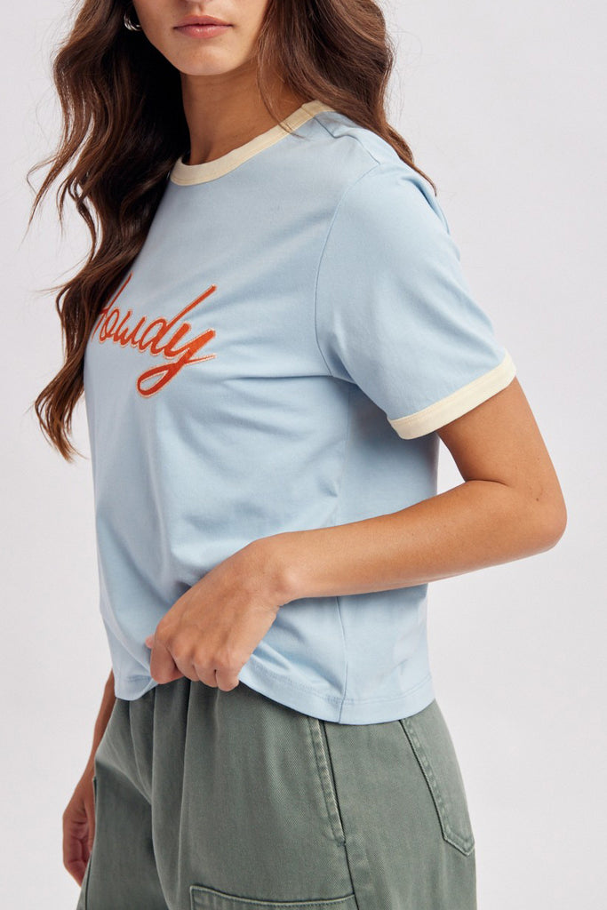 sky blue ringer tee with the message "howdy" in bold orange