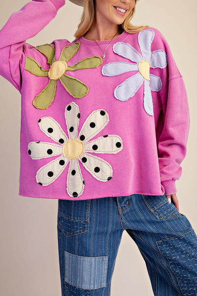 washed magenta sweatshirt with flower applique details