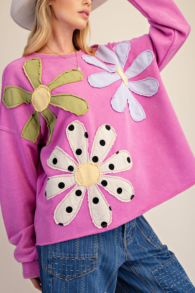 washed magenta sweatshirt with flower applique details