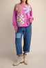washed magenta sweatshirt with flower applique details