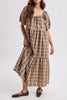 roomy midi dress in a brown plaid pattern
