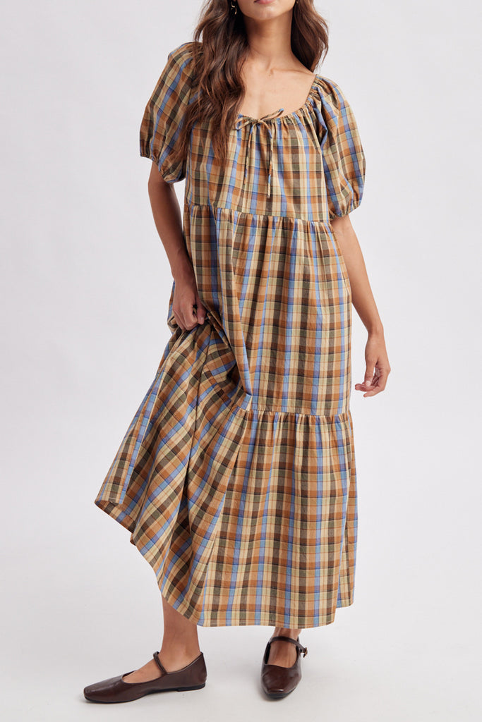 roomy midi dress in a brown plaid pattern