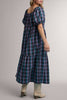roomy midi dress in a pretty purple plaid pattern