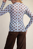 sky blue mesh layering top with polka dots in chocolate brown