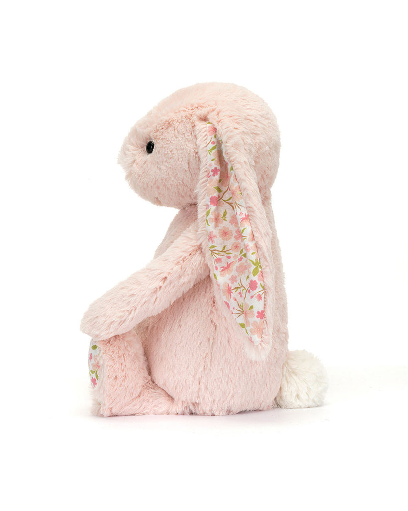 pink plush bunny with floral details on ears and paws