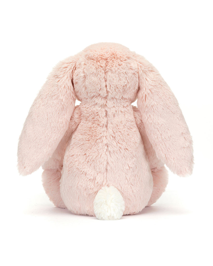 pink plush bunny with floral details on ears and paws