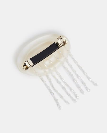 french barrette with a jellyfish design