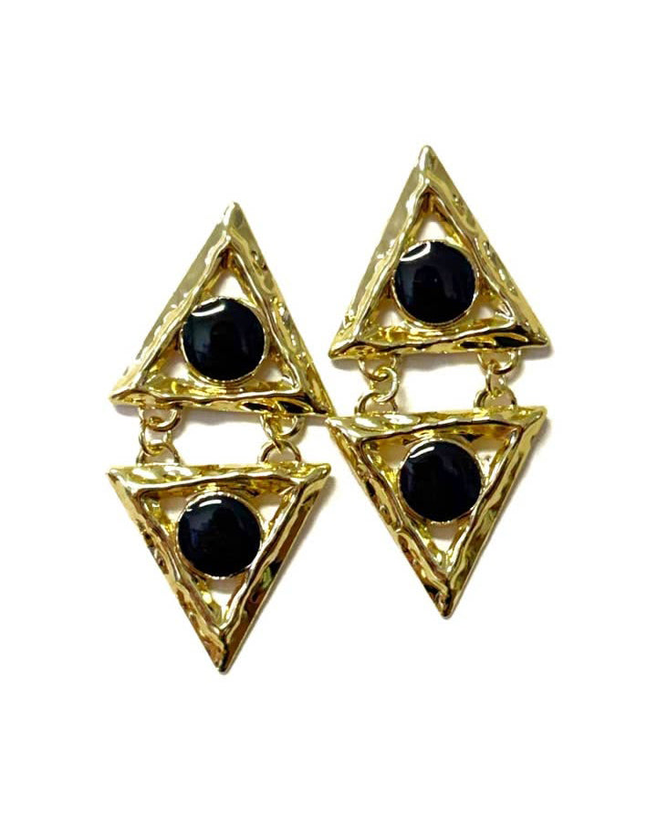 Gold triangle earrings with black stones on a white background