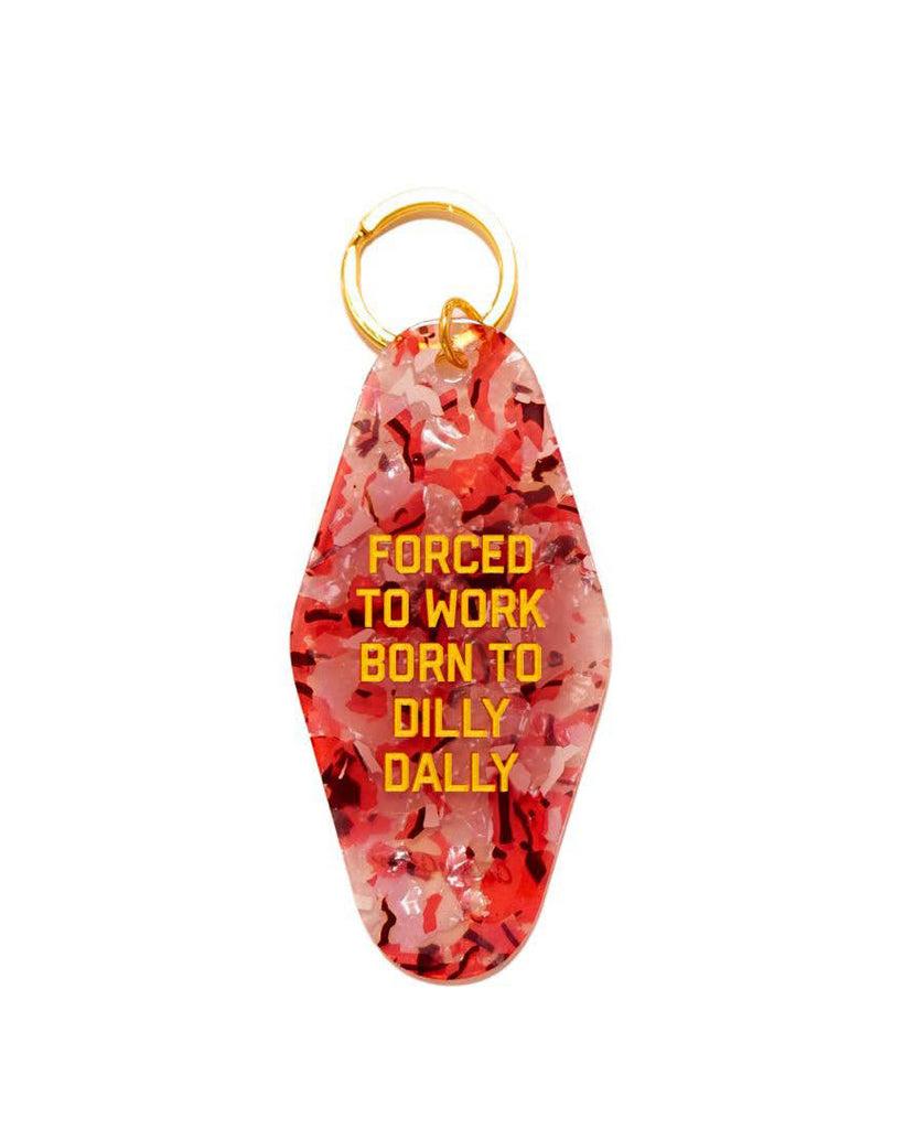 acrylic vintage inspired keychain with the message "forced to work born to dilly dally"