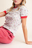 fitted ribbed baby tee with a sweet ditsy floral pattern and red ringer details 