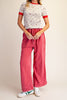 fitted ribbed baby tee with a sweet ditsy floral pattern and red ringer details 