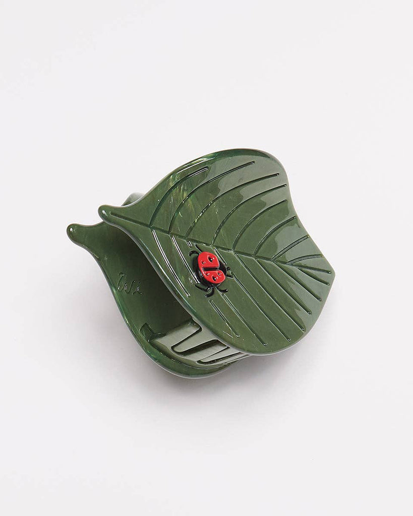 leaf shaped hair claw with sweet ladybug detail 