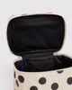large cosmetic case in a cream and black polka dot print