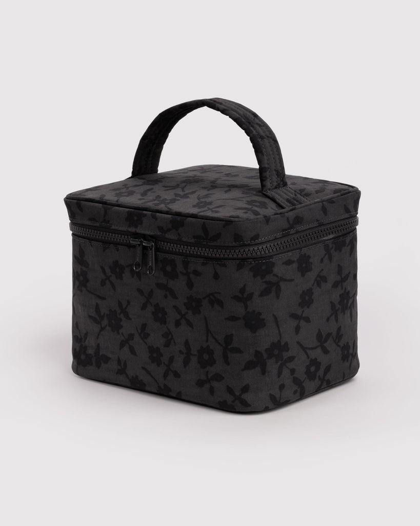 large cosmetic case in a charcoal grey ditsy floral pattern 