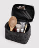 large cosmetic case in a charcoal grey ditsy floral pattern 