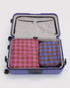 large nylon packing cube set in colorful plaid prints