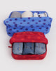 large nylon packing cube set in colorful polka dot prints