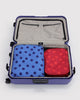 large nylon packing cube set in colorful polka dot prints
