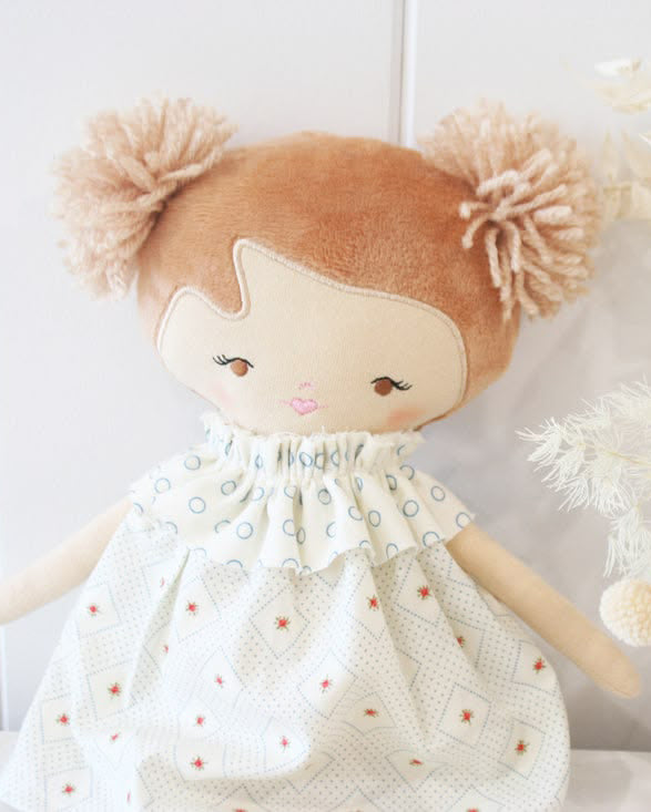 layla doll with a blue rose floral printed dress 