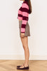 knit cardigan in hot pink and burgundy stripes with a shrunken fit